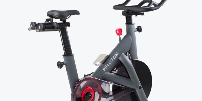 Black, grey, and red exercise bike closeup.